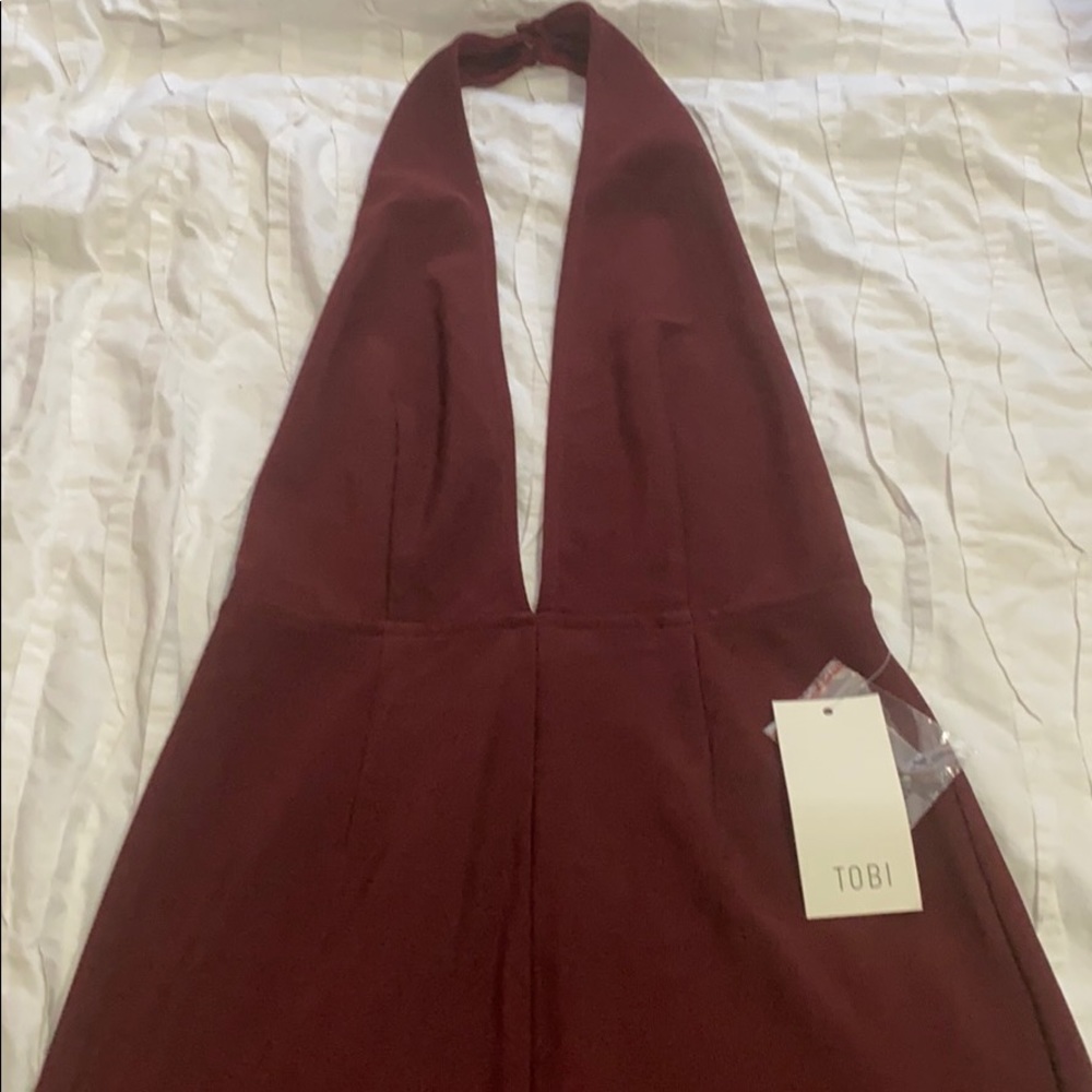 Deep plunge, backless burgundy gown NWT